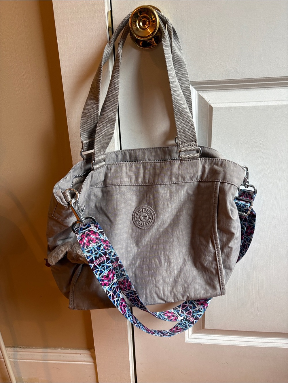 Kipling Light Gray Canvas Tote with Patterned Crossbody Strap